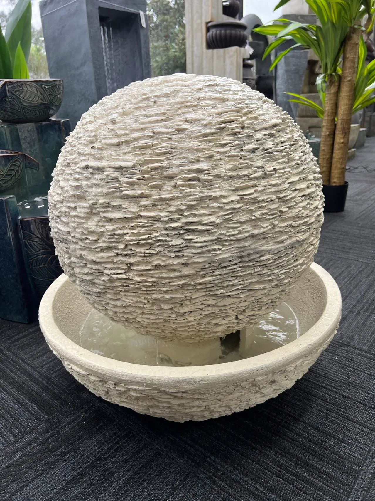 Caliante Outdoor Round Fountain with textured surface and round base Beige or Black Colour - Image 4